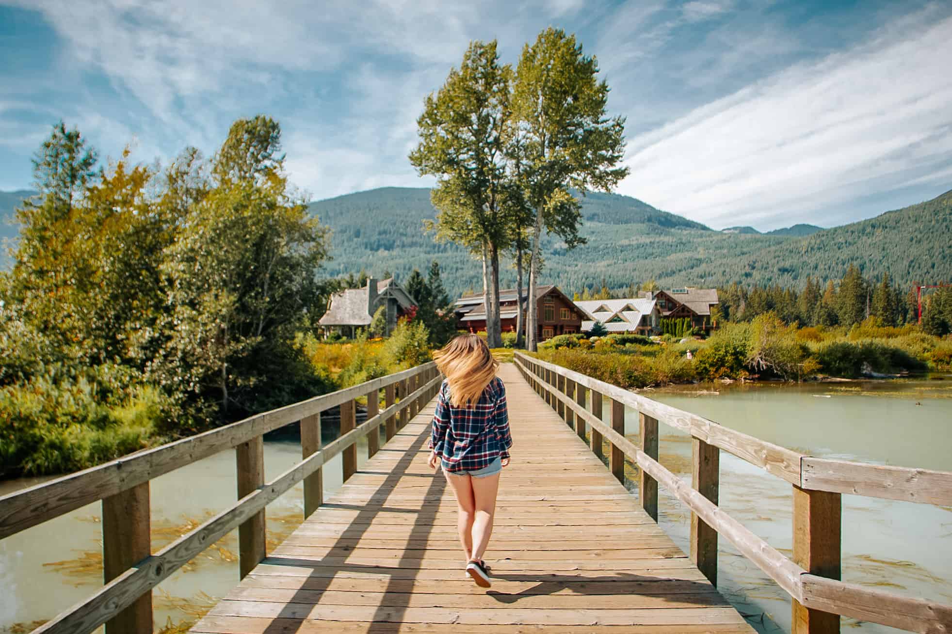 Rachael walking the boardwalk at Green Lake in Whistler.