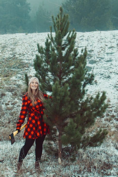 Cutting our own Christmas tree in the most Canadian clothes I own
