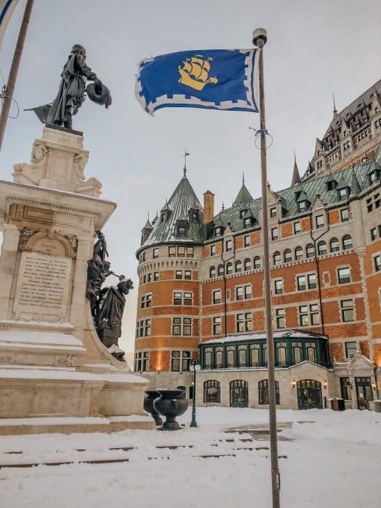 A statue of Samuel du Champlain stands outside the entrance of the Chateau Frontenac in Quebec City, Canada