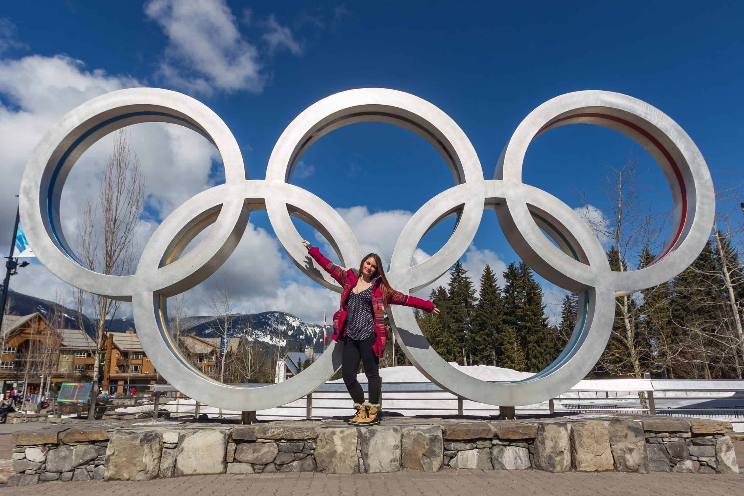 Rachael in front of the Olympic Rings in Olympic Plaza, Whistler.