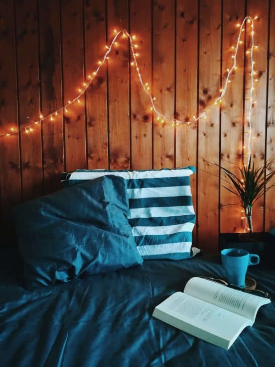 Fairy lights, comfy pillows, a good book and coffee is the best way to spend time at the cabin.