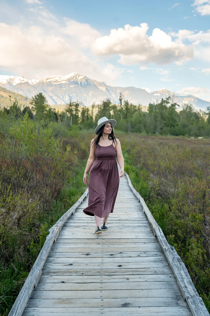 Rachael walking to boardwalk at One Mile Lake in Pemberton, BC.